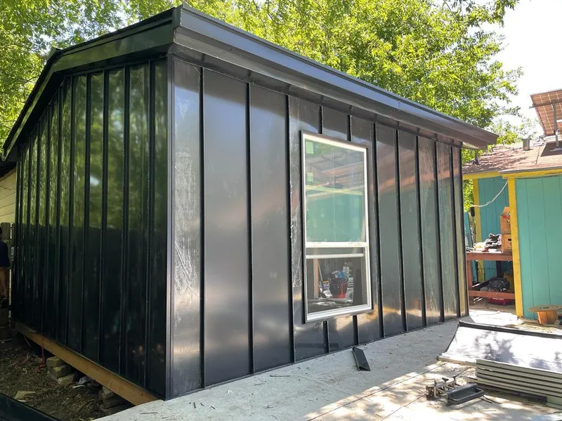 Black standing seam metal wall panels for Metal Roof Installation in St. Simons