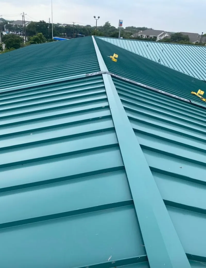 Green commercial metal roof ridge and valley for Metal Roof Repair in St. Simons